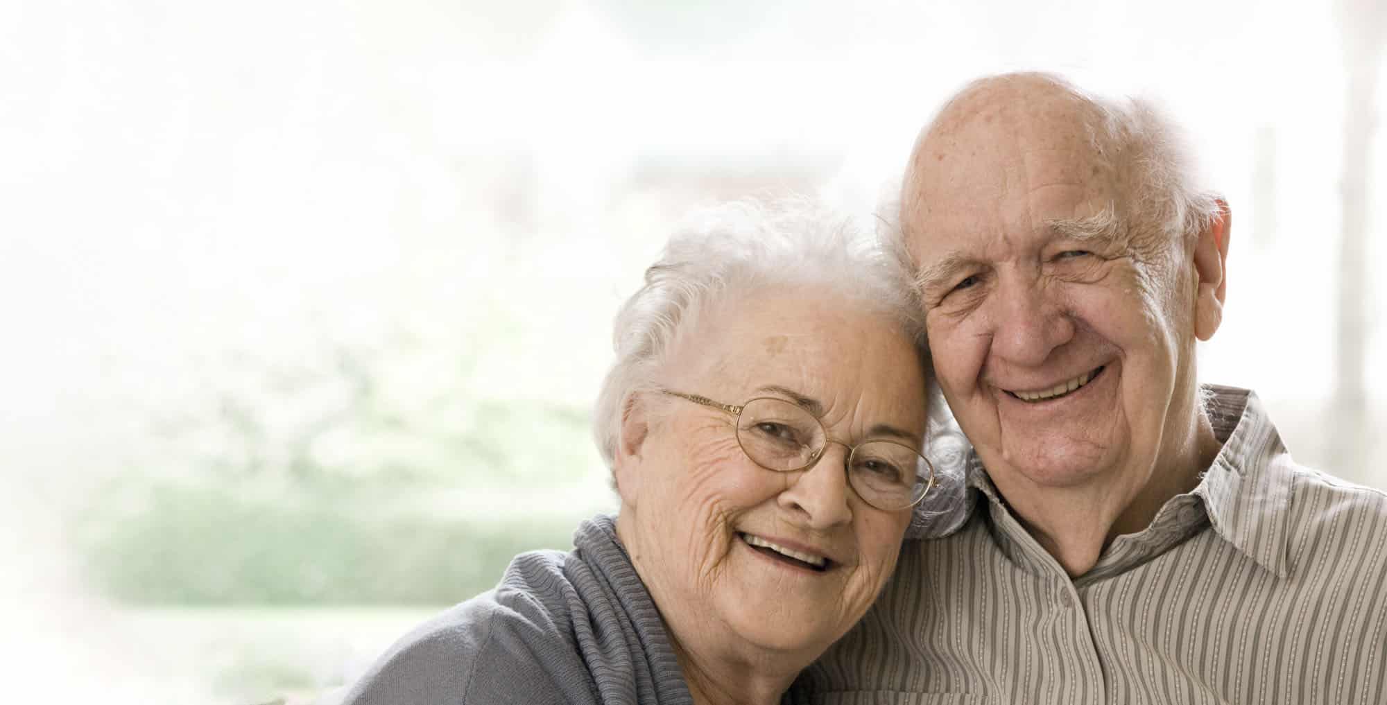 elderly couple using a life settlement to pay for long term care expenses
