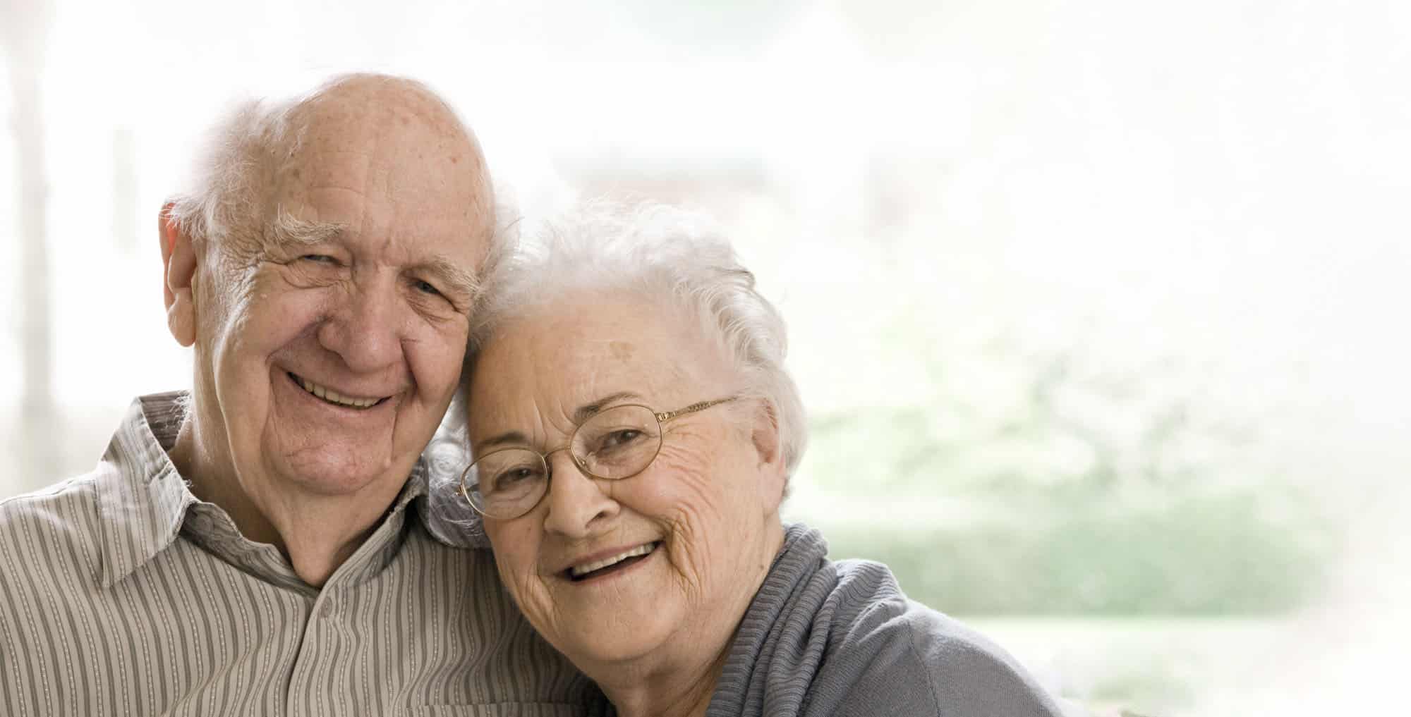 elderly couple using a life settlement to pay for long term care expenses