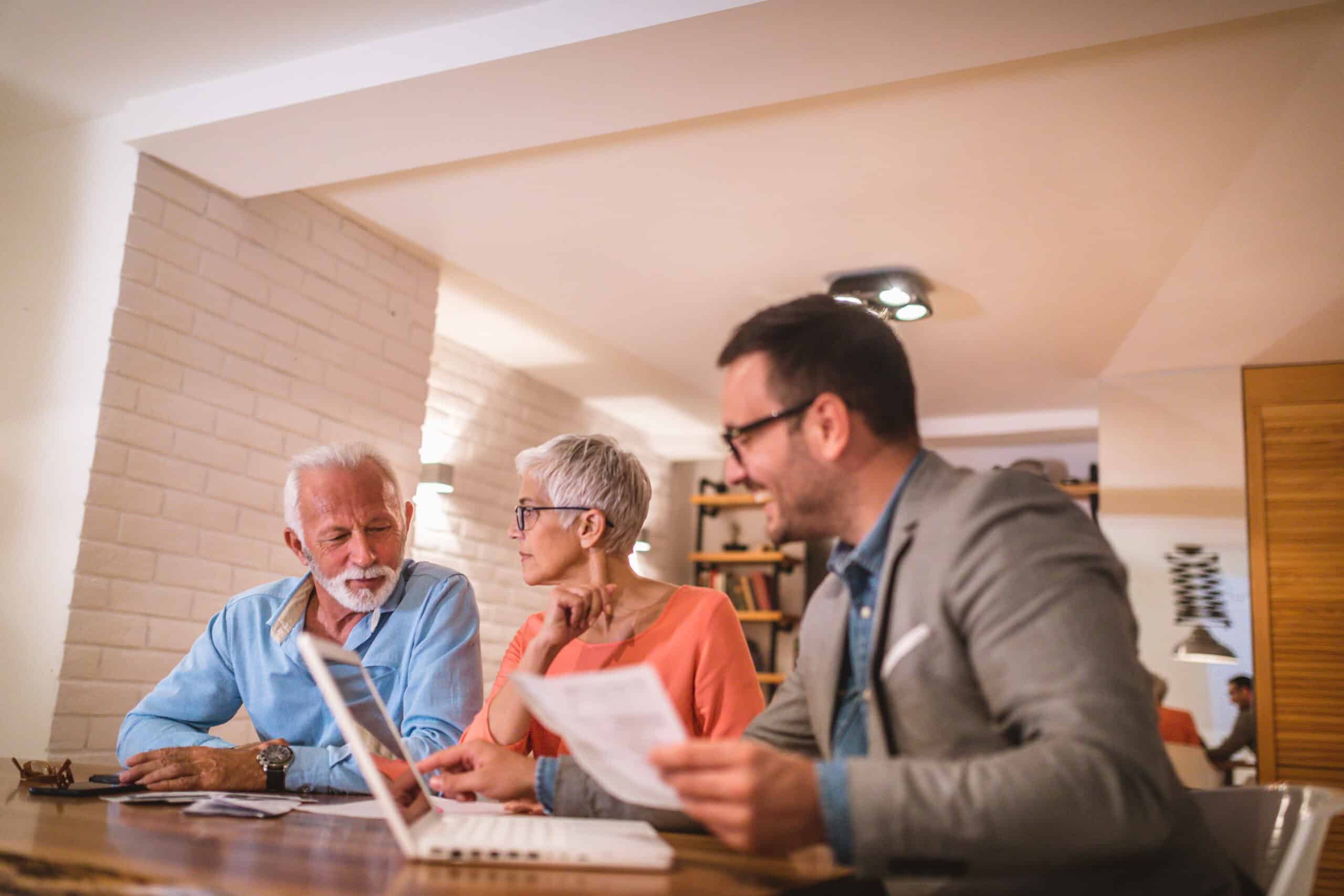 A financial advisor working with two senior clients