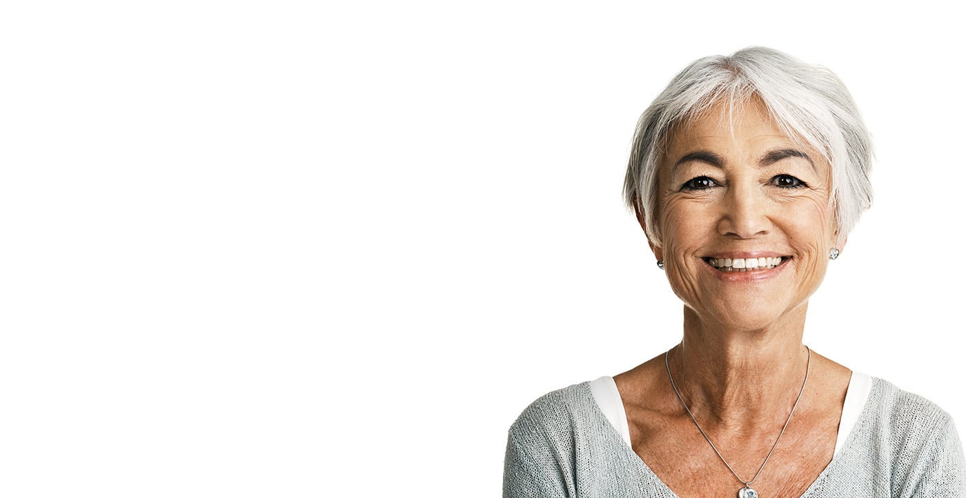 woman in sweater smiling at camera